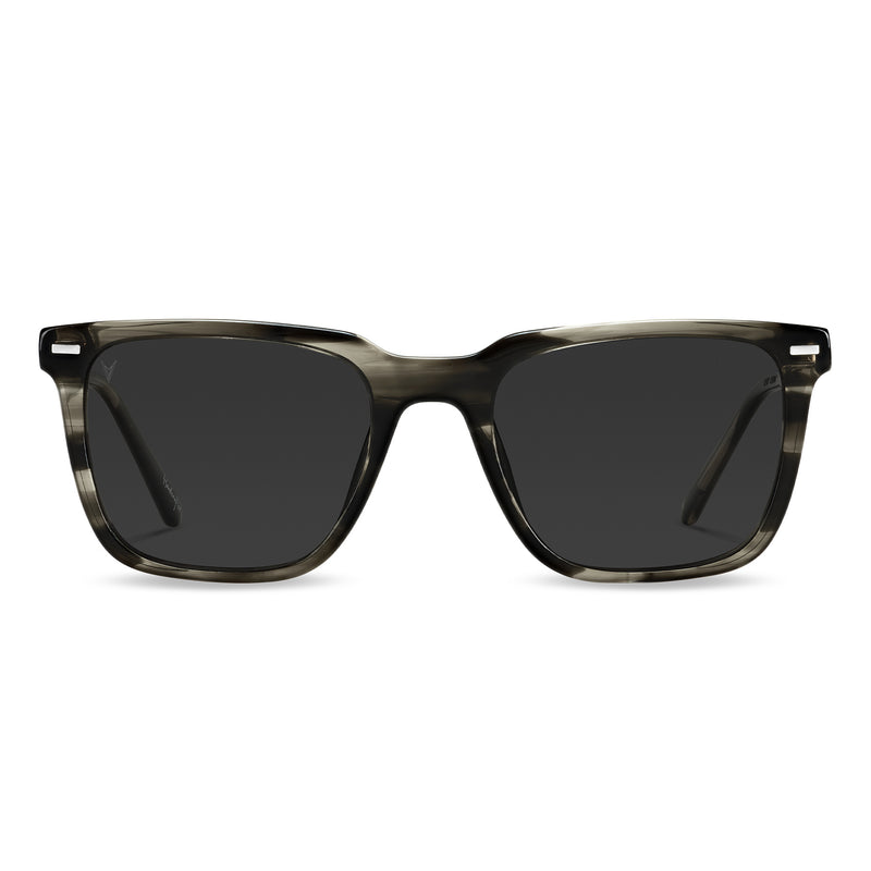 A pair of square-framed sunglasses with a smoke tint, featuring Italian marble inlay on the temples.
