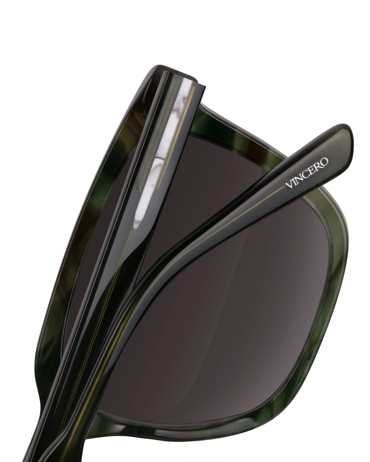 Green havana sunglasses on white