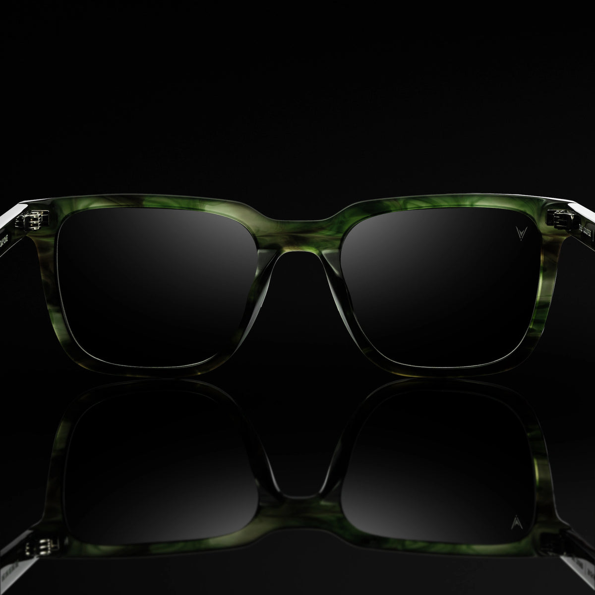 Green havana sunglasses on black