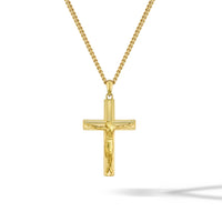 Gold crucifix pendant on a chain against a white background