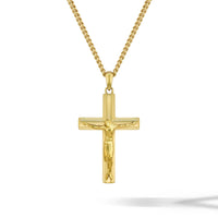 Gold crucifix pendant necklace on a white background