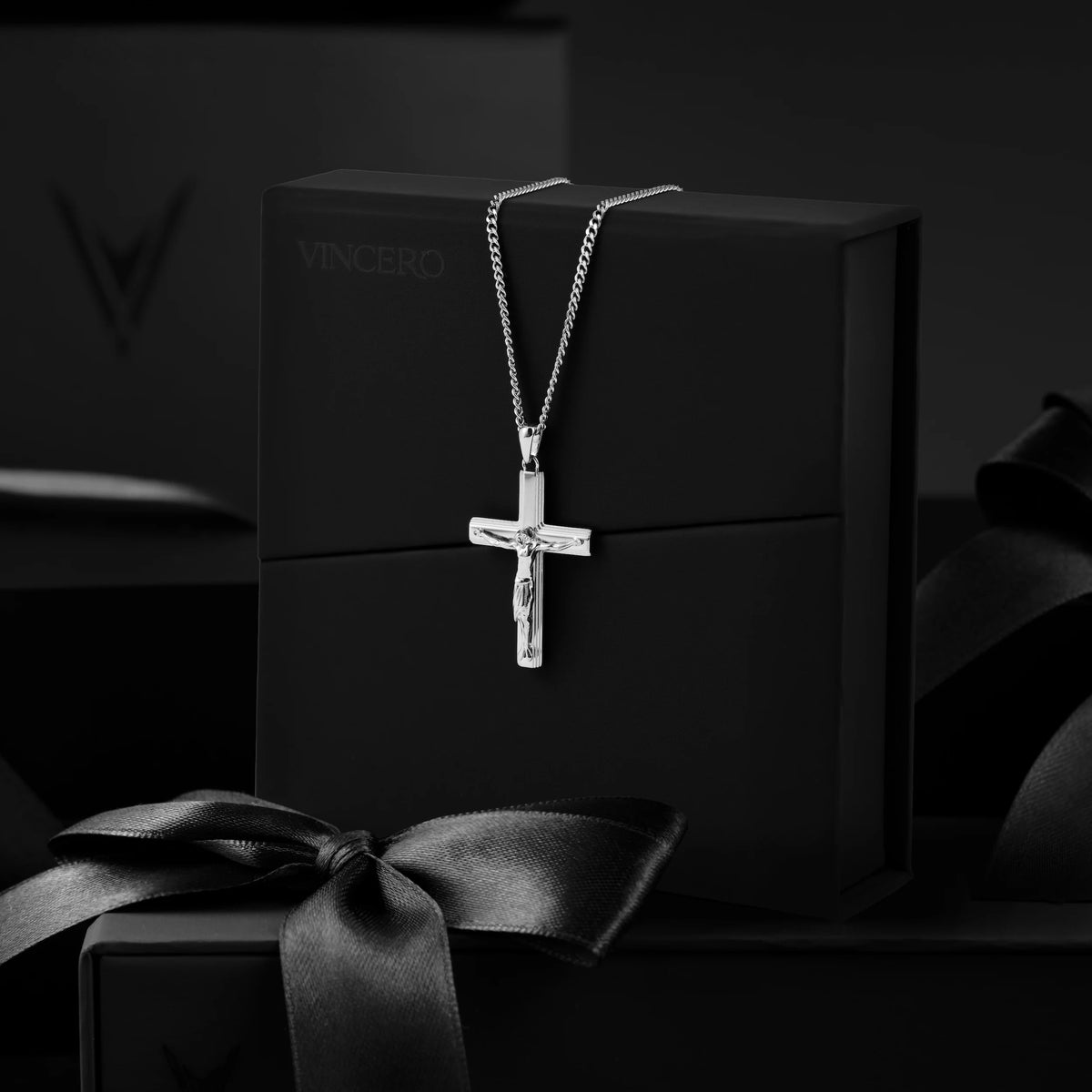 Silver chain necklace with a cross pendant 