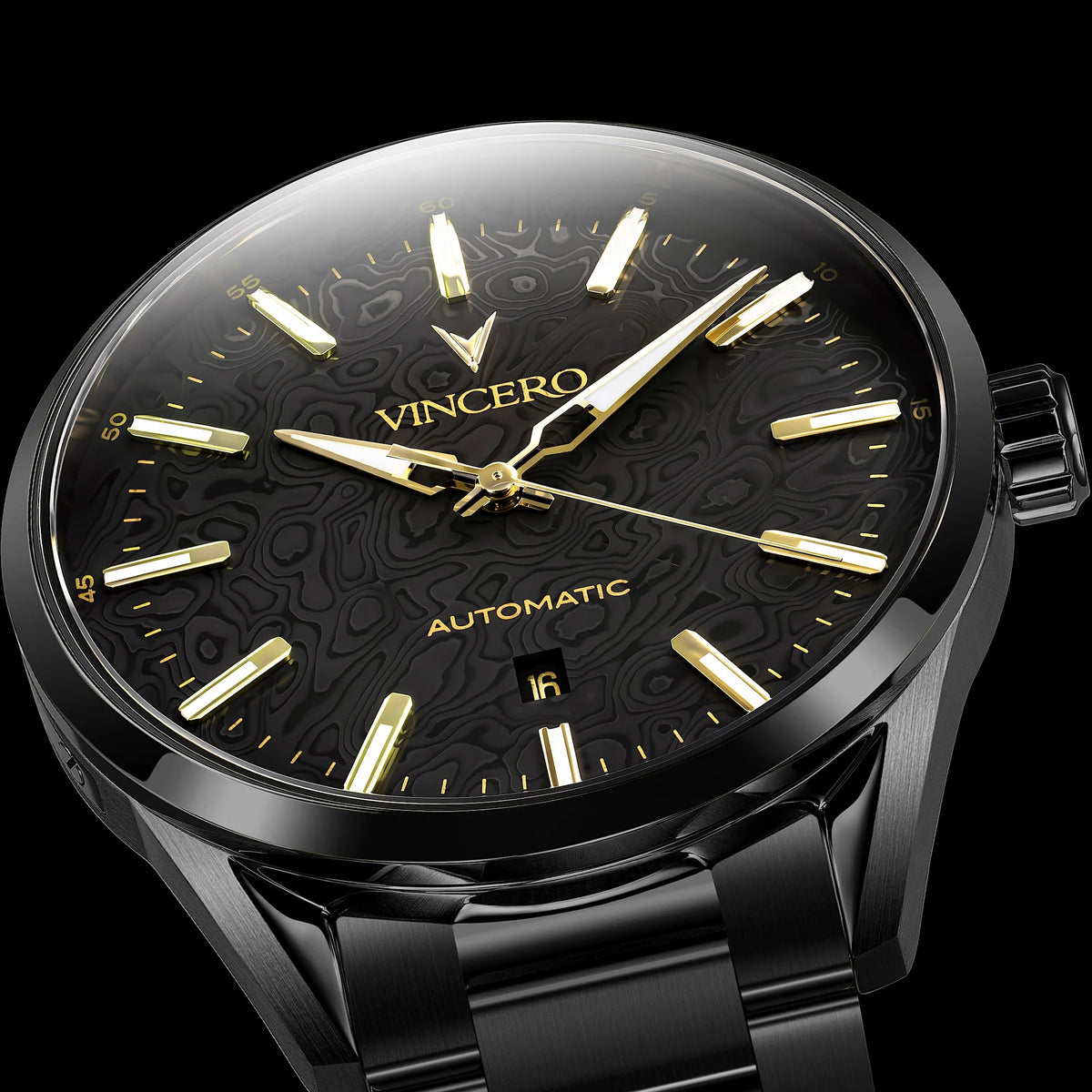 A close-up of a Vincero Automatic watch with a black dial, gold-tone hands and markers, and a black metal case and bracelet against a black background.