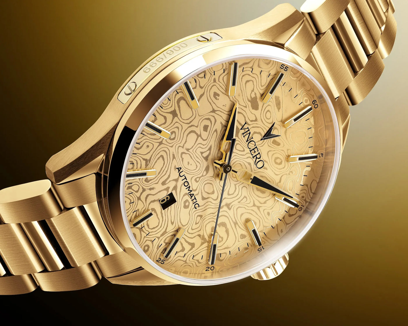 A gold-tone stainless steel wristwatch with a patterned dial and matching metal bracelet, shown at an angle against a dark gold gradient background. The brand name 'VINCERO' is visible on the dial.