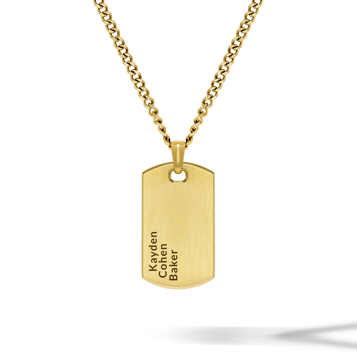 Gold necklace with a dog tag pendant on a white background