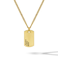 Gold necklace with a dog tag pendant on a white background