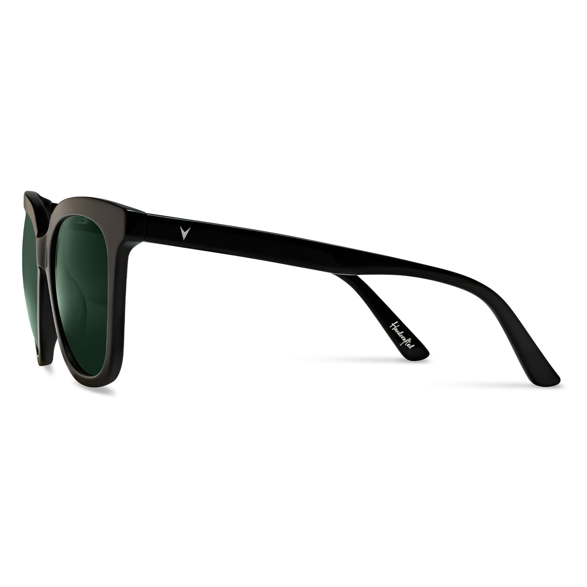 Black sunglasses with green lenses on a white background