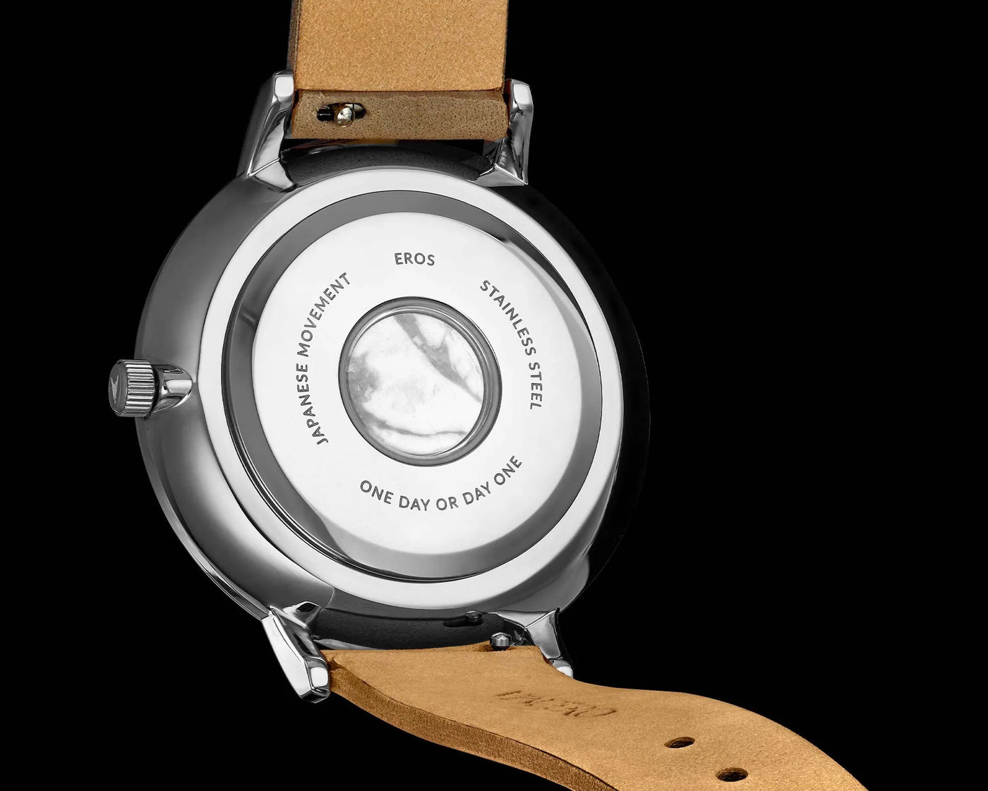 Watch face with brand name 'Eros' on a black background