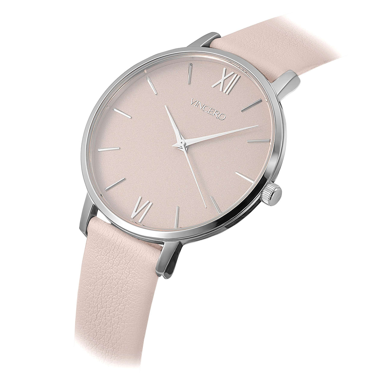 Wristwatch with a light pink strap and beige dial on a white background