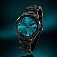 Black wristwatch with a blue face on a dark background
