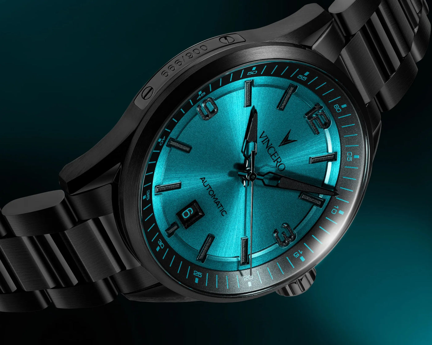 Black wristwatch with a blue glowing face on a dark background
