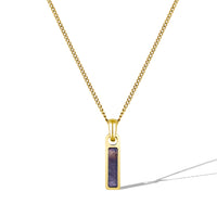 Gold necklace with a rectangular pendant on a white background