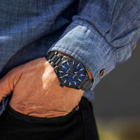 Man wearing blue Carbon men's watch pocket shot 
