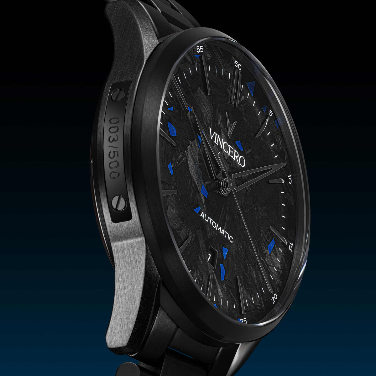 Black wristwatch with blue accents on a dark background
