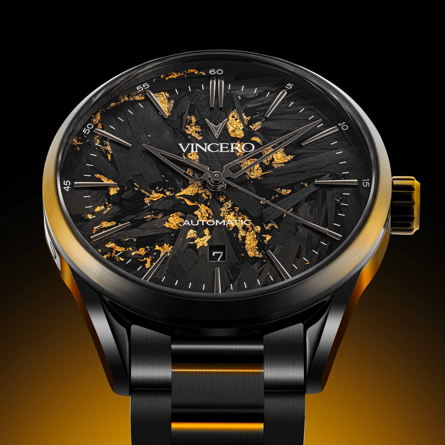 Luxury watch with black and gold design on a dark background