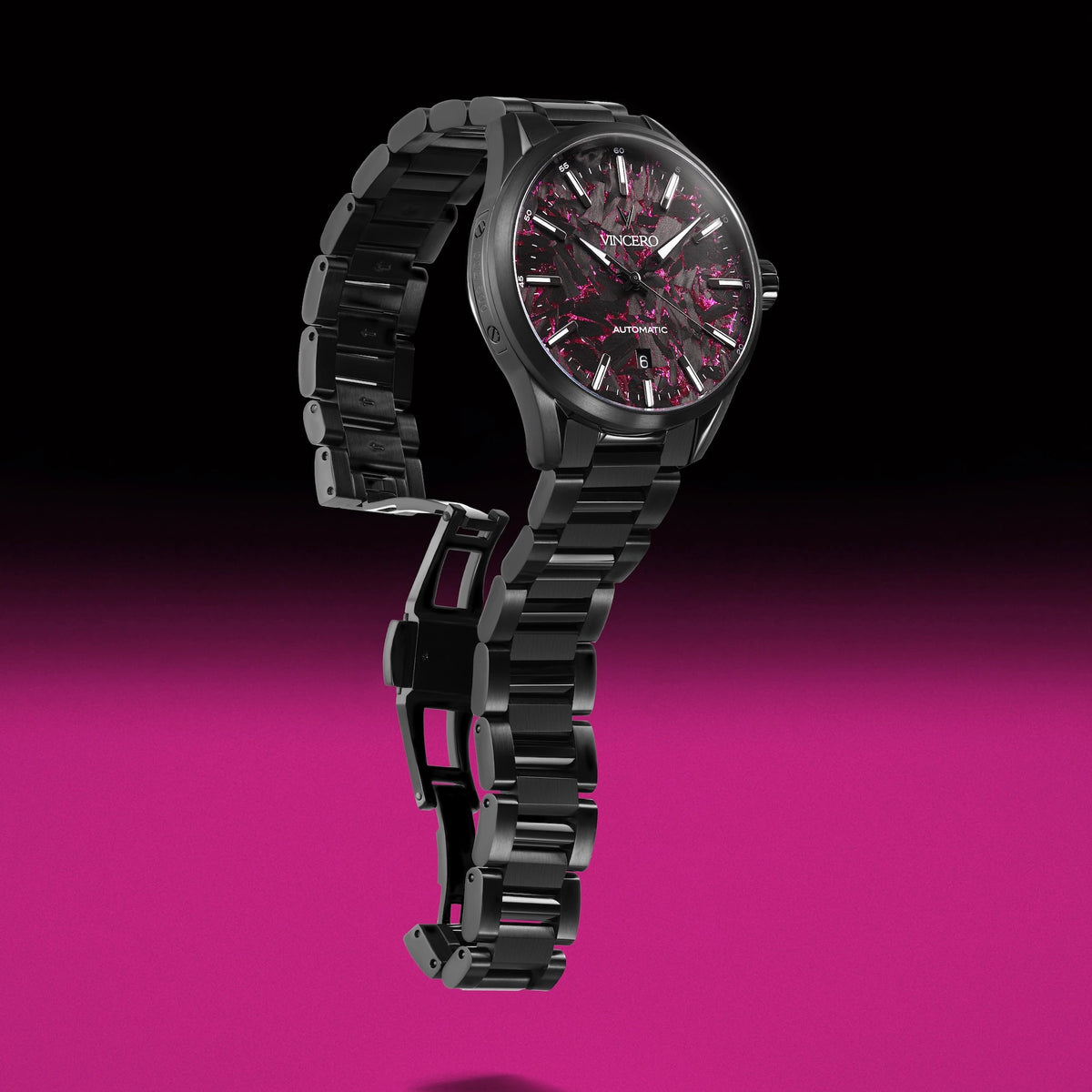 Black watch with a pink and black face on a pink background