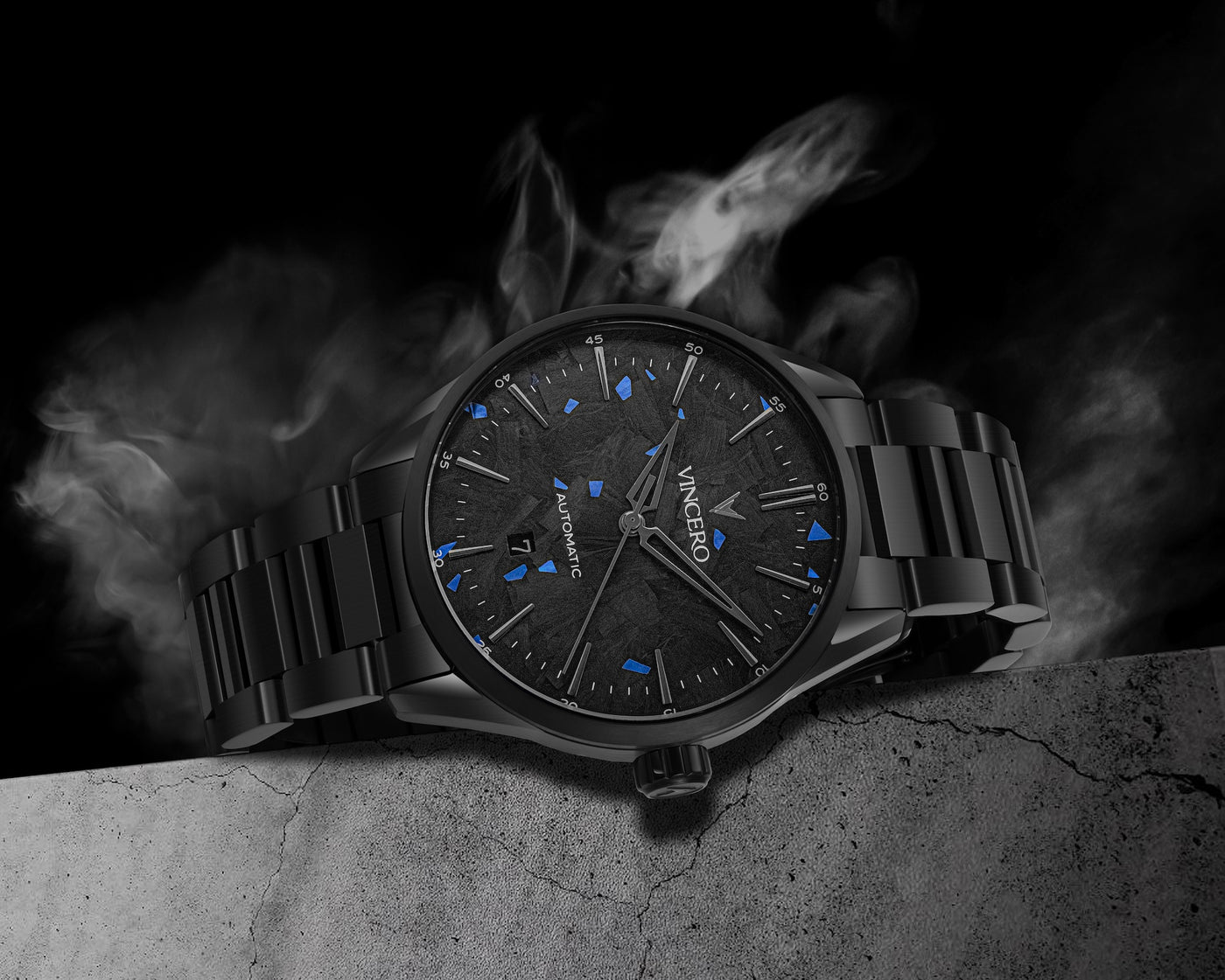 Black wristwatch with detailed face on a dark background