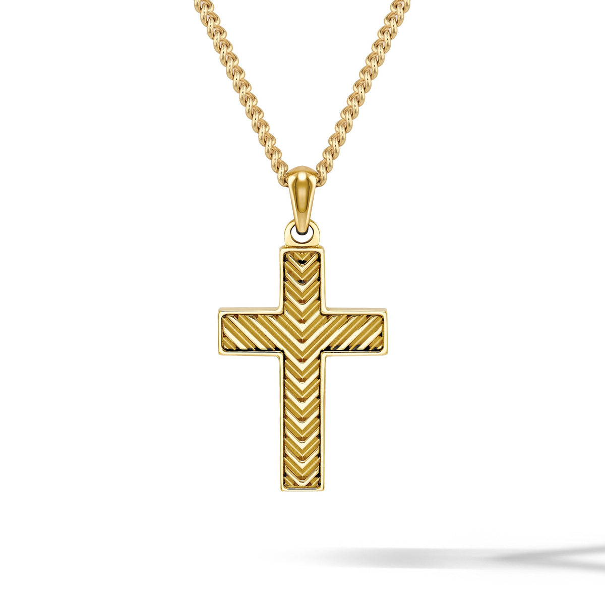 A gold cross pendant necklace with a textured chevron pattern on the front, suspended from a gold chain against a clean white background.