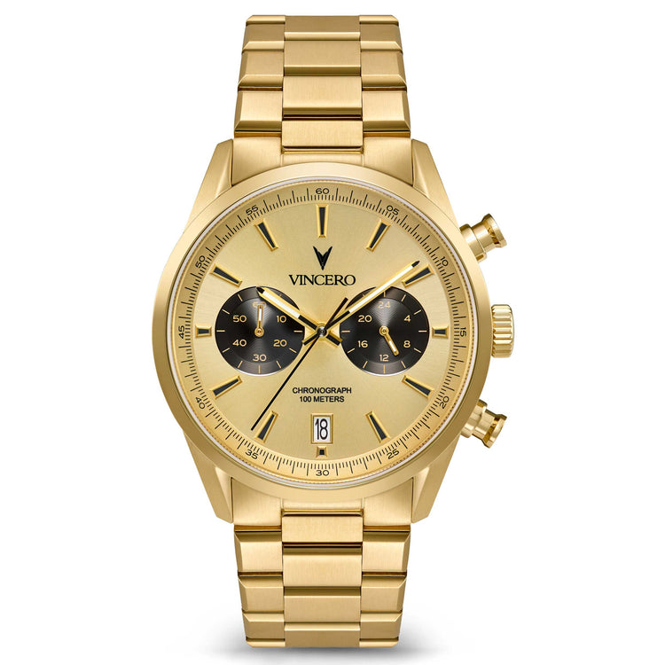 Gold wristwatch with a detailed face on a white background