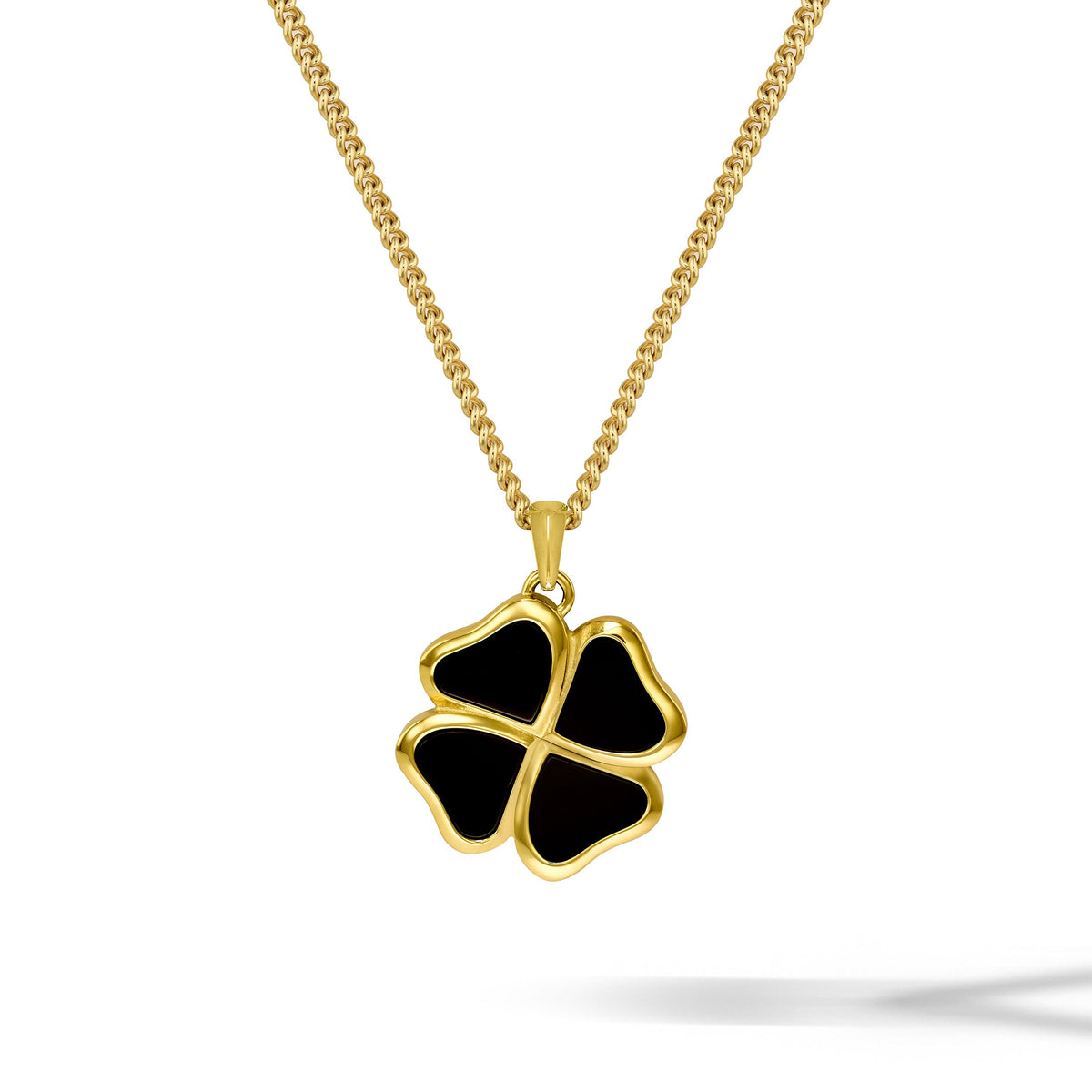 Gold necklace with a black four-leaf clover pendant on a white background