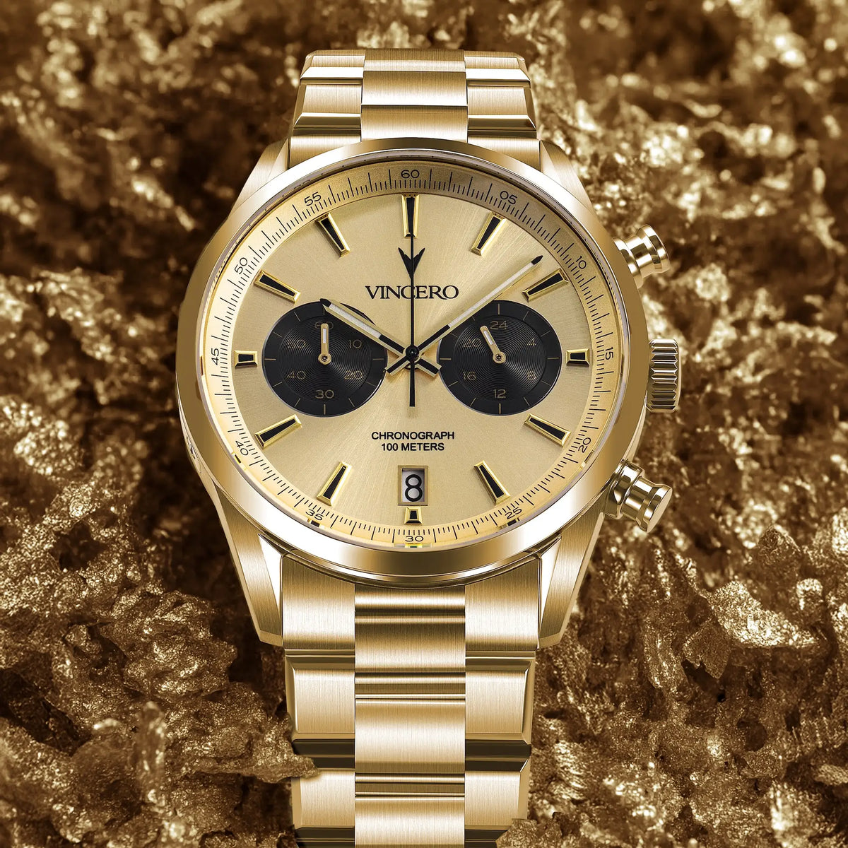 Gold wristwatch with a detailed face on a textured gold background