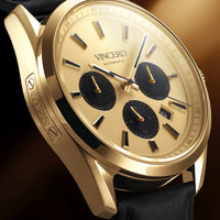 Gold wristwatch with 'Vincero' branding on a dark background