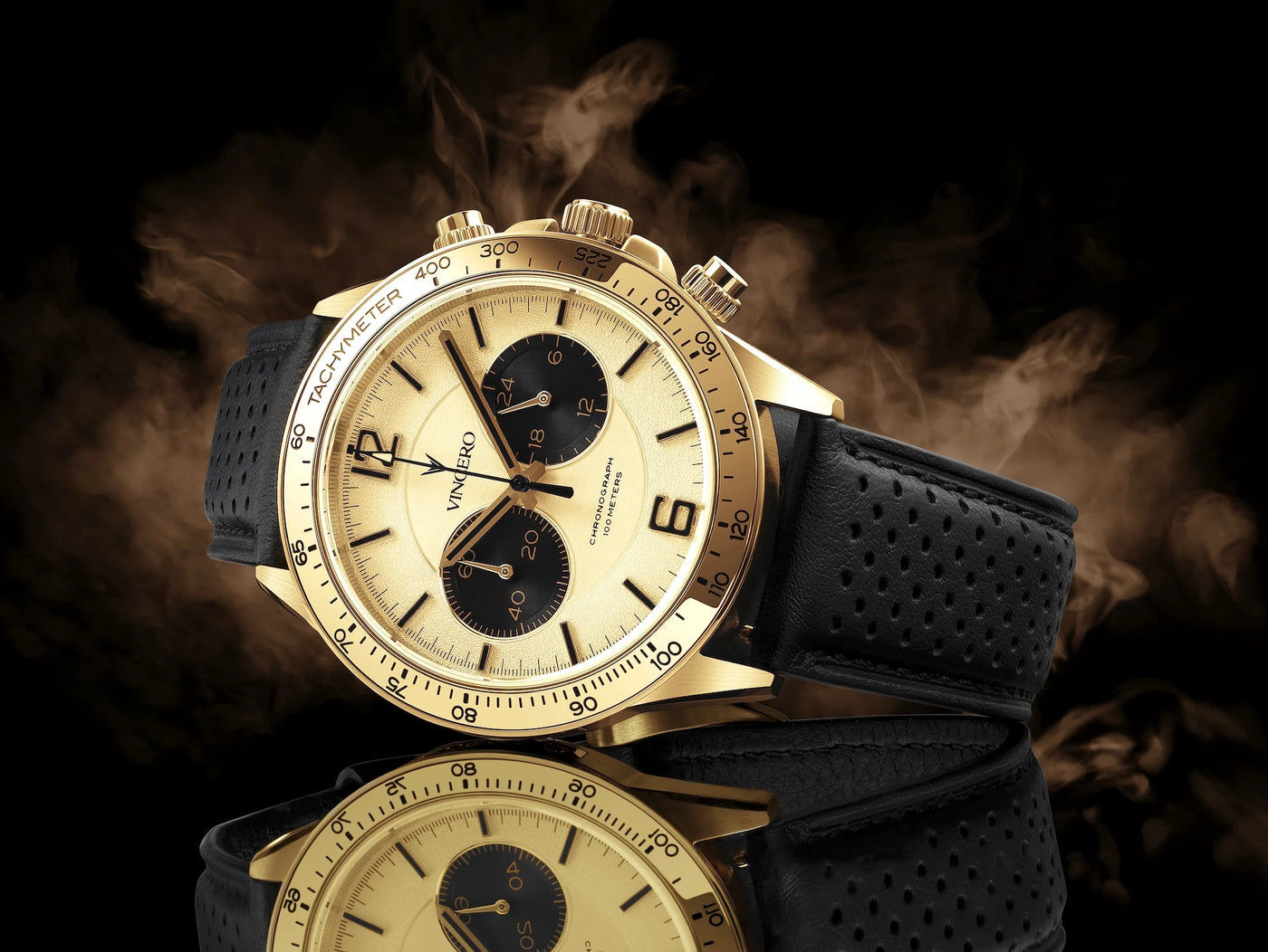Gold wristwatch with black leather strap on a dark background