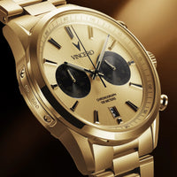 Gold wristwatch with 'Vincero' brand on a dark background