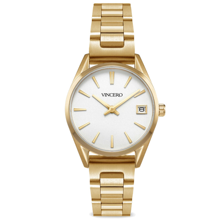 A gold stainless steel Vincero watch with a white dial and a date display, positioned on a plain background.