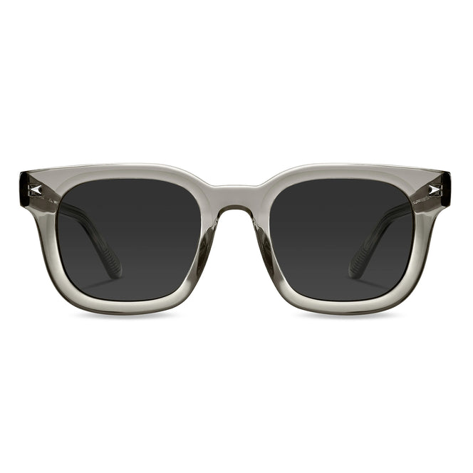 A pair of square-shaped, stone-colored sunglasses with a sleek and modern design, featuring polarized lenses and a brown acetate frame.