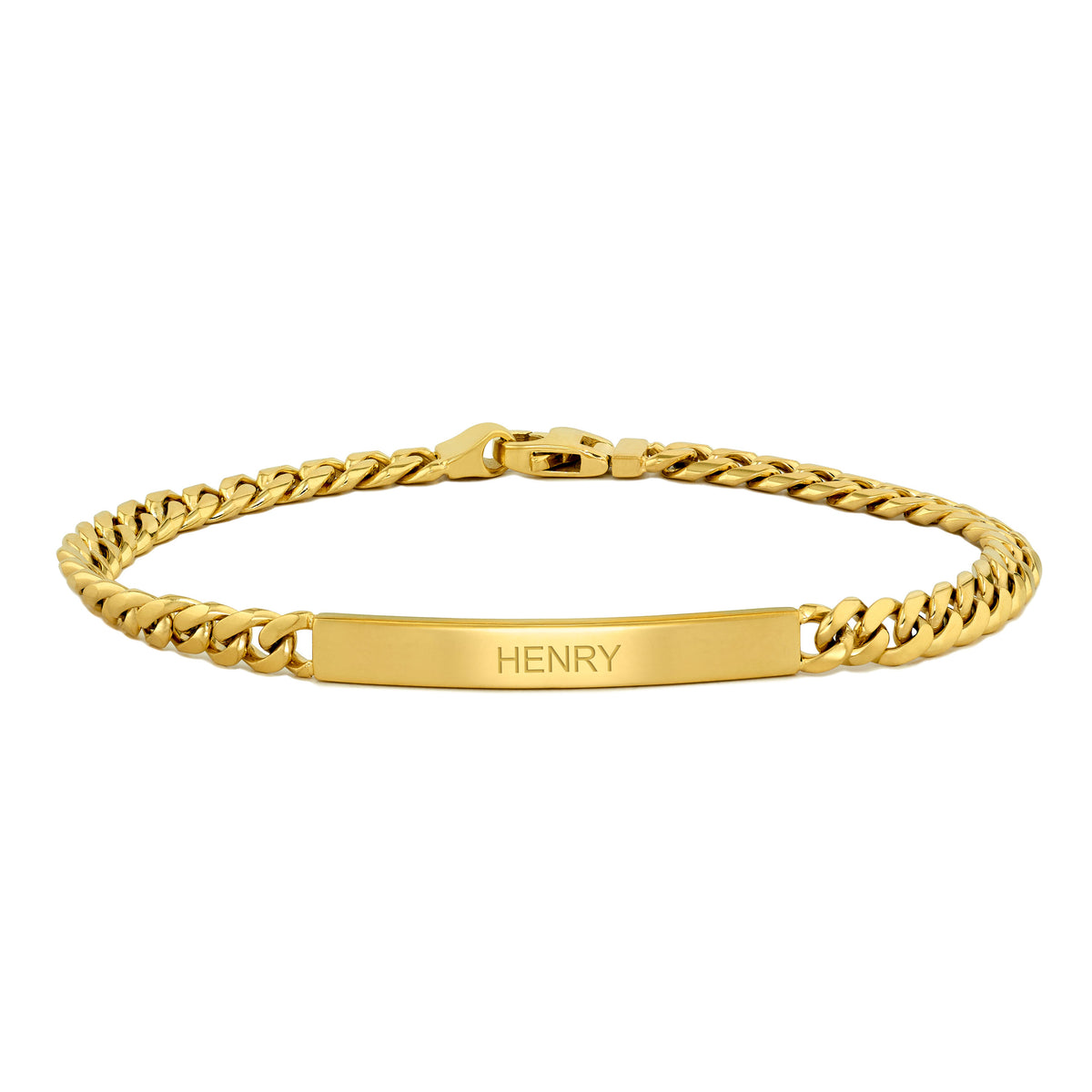 A gold-tone Cuban link ID bracelet with a polished bar engraved with the name 'HENRY', shown on a plain white background.