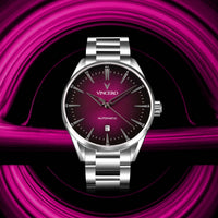 Silver Vincero watch with a dark face on a pink and black swirling background