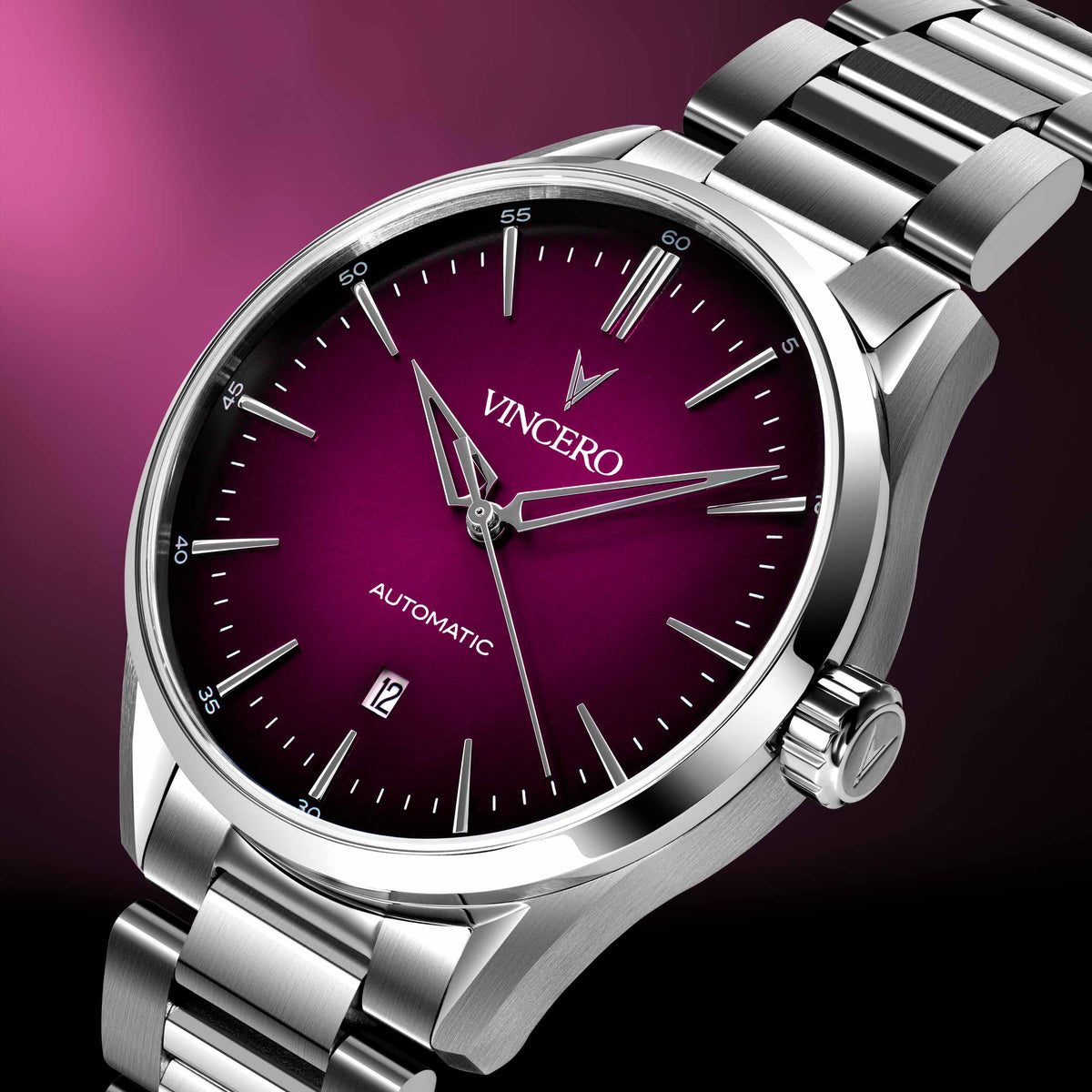 Silver wristwatch with a purple face on a dark background