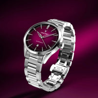 Silver watch with a purple face on a purple background