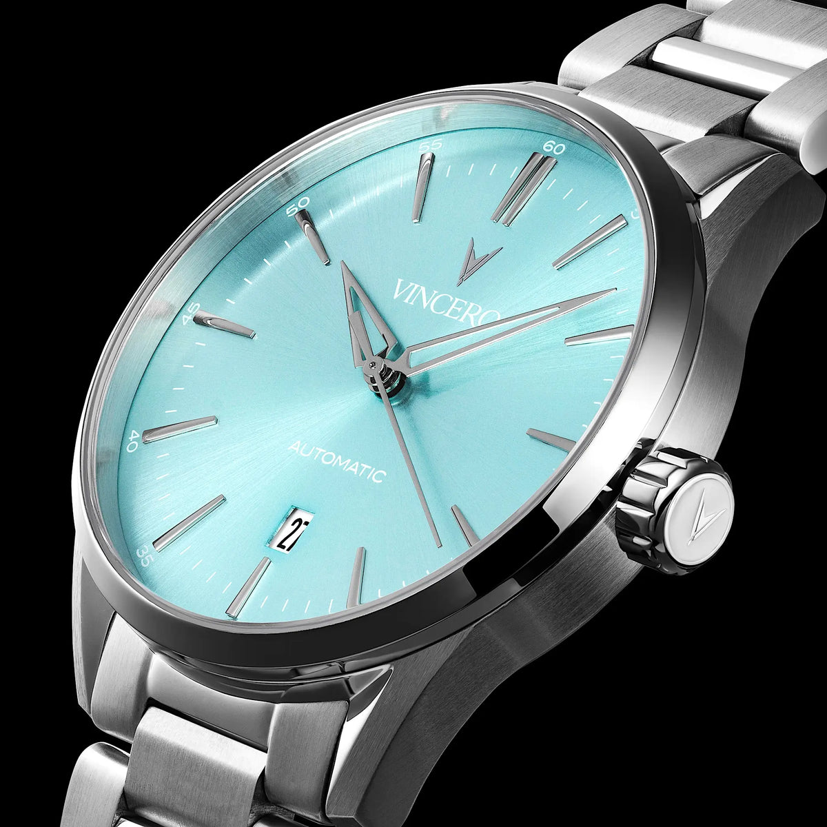 Silver wristwatch with a turquoise dial on a black background