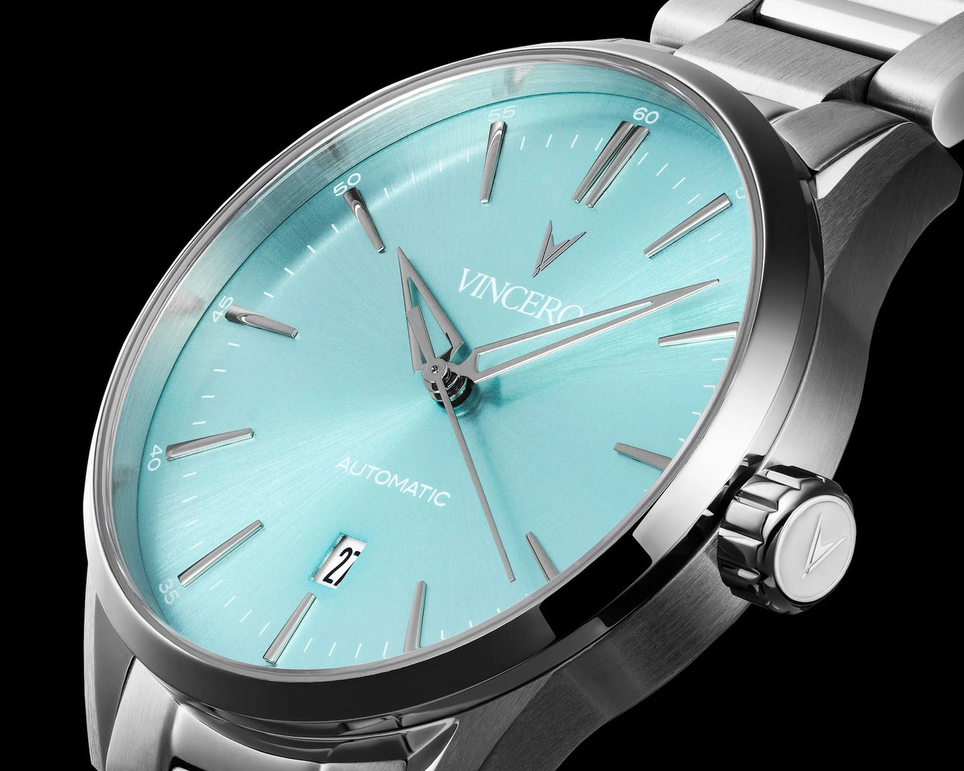 Close-up of the Icon Limited Release watch, featuring a Carolina blue face, stainless steel case, and matching steel band.