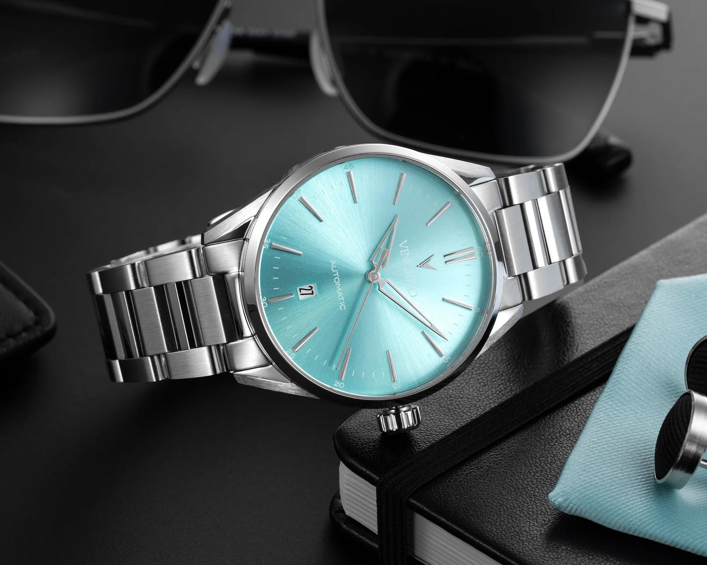 Icon Limited Release watch, featuring a Carolina blue face, stainless steel case, and matching steel band.