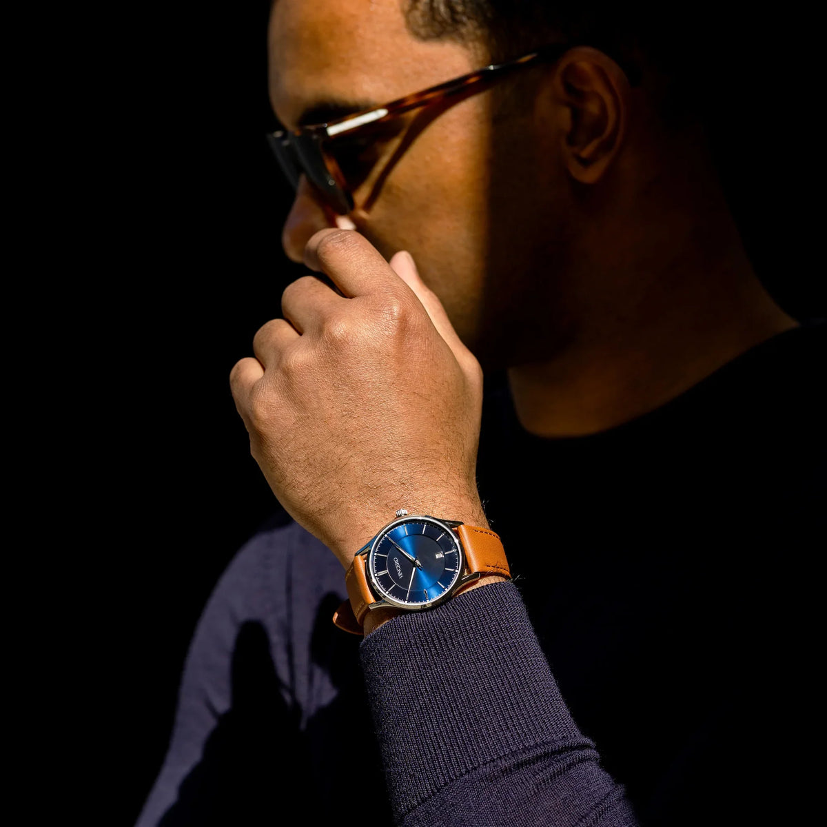 Blue And tan leather wrist shot