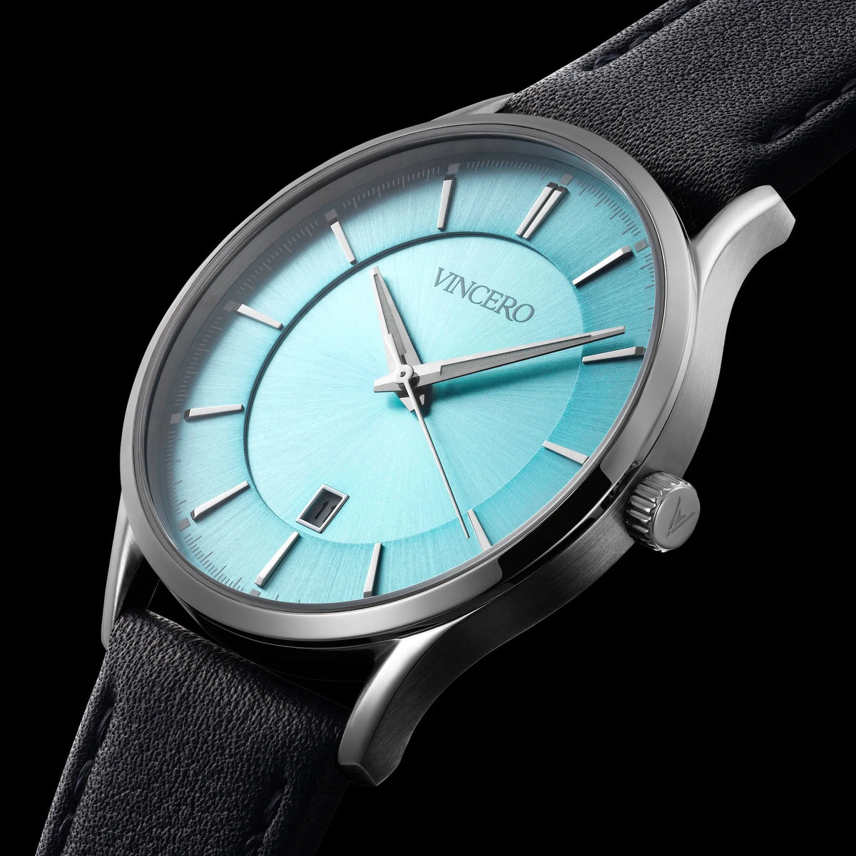 Wristwatch with a blue face and black strap on a black background