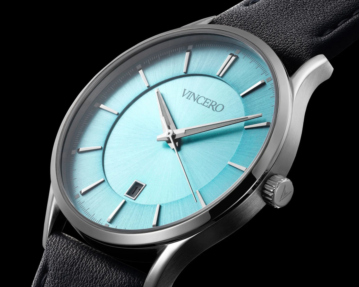 Close-up of the Kairos Limited Release watch, featuring a Carolina blue face, stainless steel case, and black leather band.