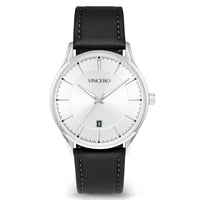 A classic analog wristwatch with a silver stainless steel case, a white dial with slim silver hands and hour markers, and a black leather strap with visible stitching.