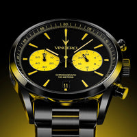 Vincero watch with black and yellow face on a dark background