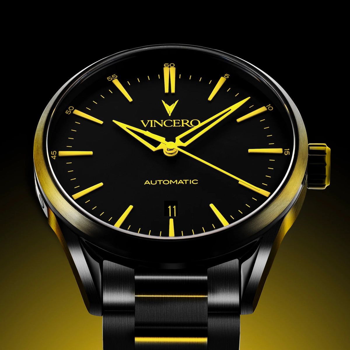 Black and gold Vincero watch on a dark background