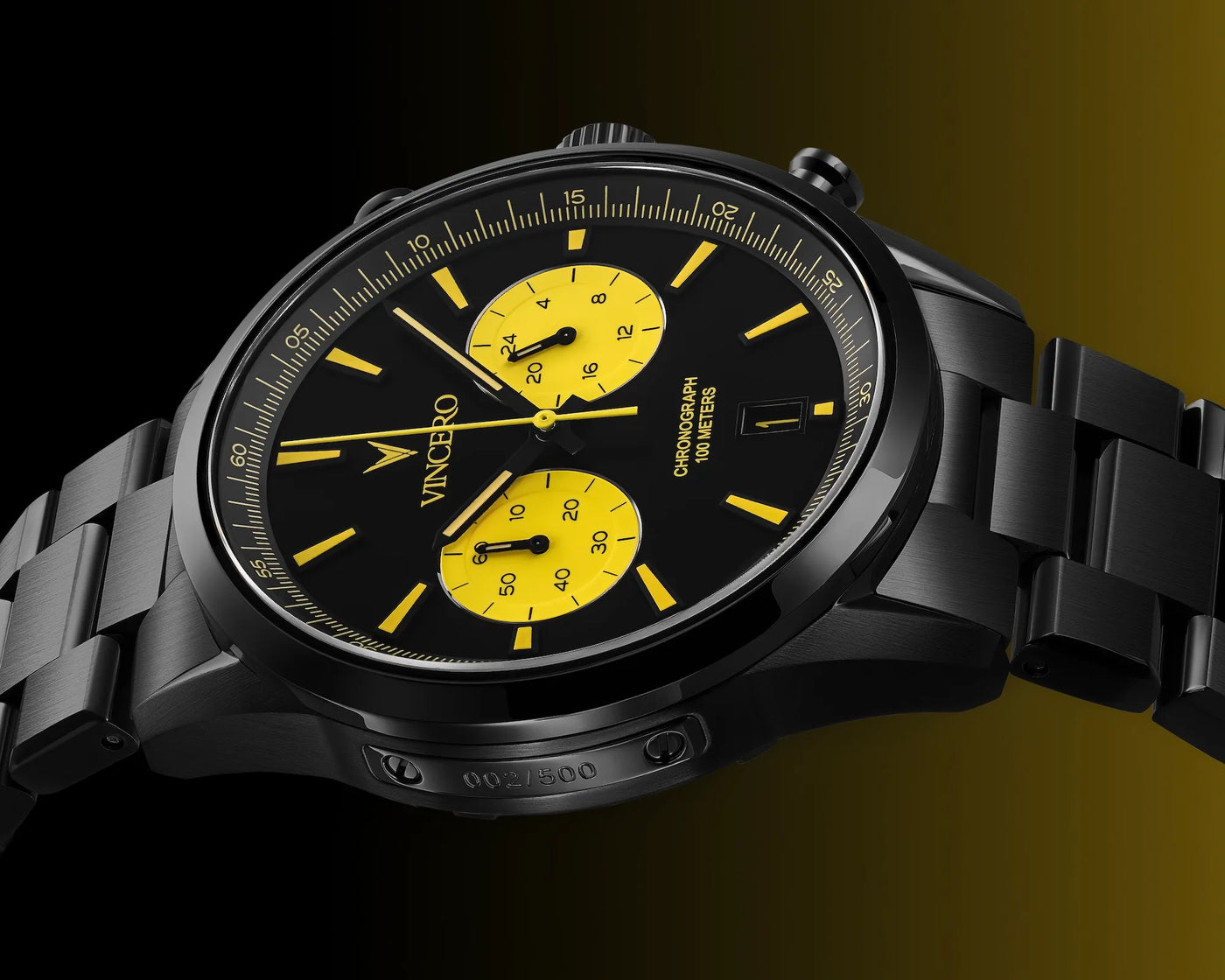 Black wristwatch with yellow details on a dark background