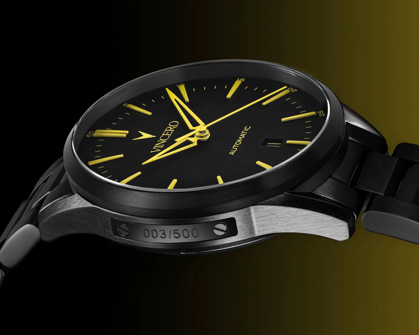 Watch with black face and yellow hands on a dark background