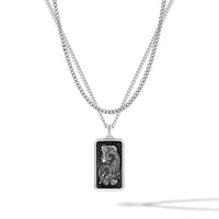 Silver necklace with a rectangular pendant on a white background