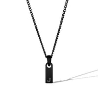Black necklace with a pendant featuring the letter 'J' on a white background