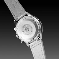 Watch with gray leather strap and silver case on a black background