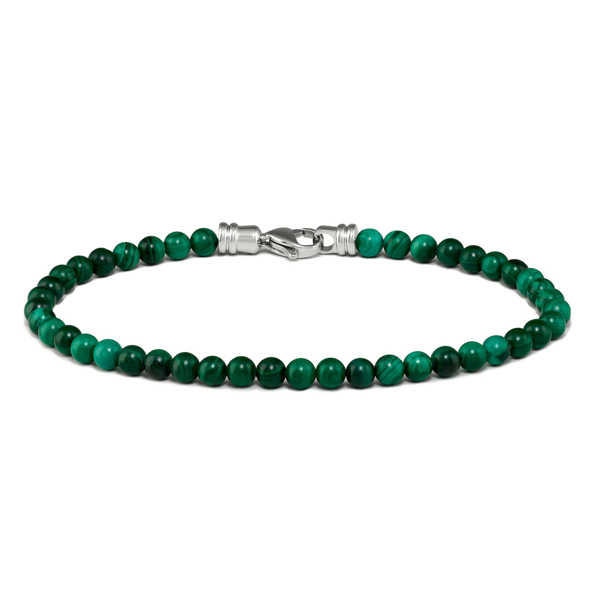 A green bead bracelet with a metallic clasp, likely representing malachite.