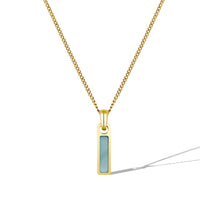 Gold necklace with a rectangular pendant on a white background